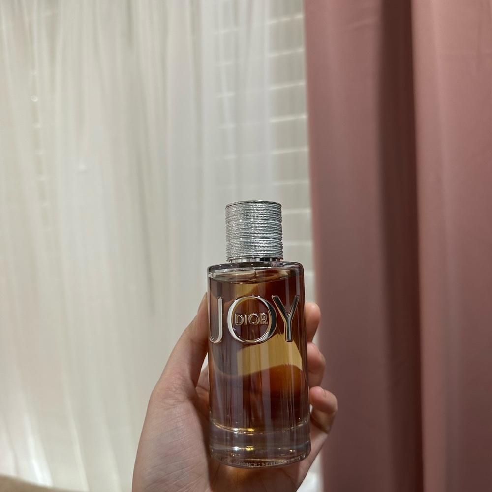 Dior JOY Perfume Bottle - Amber Liquid with Silver Cap